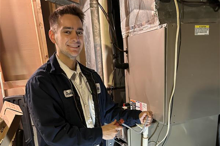 Person working on heating system